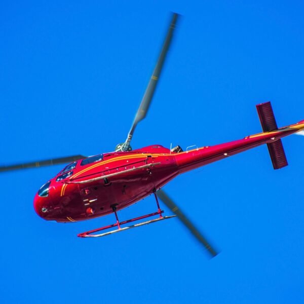 Red Helicopter on the Sky