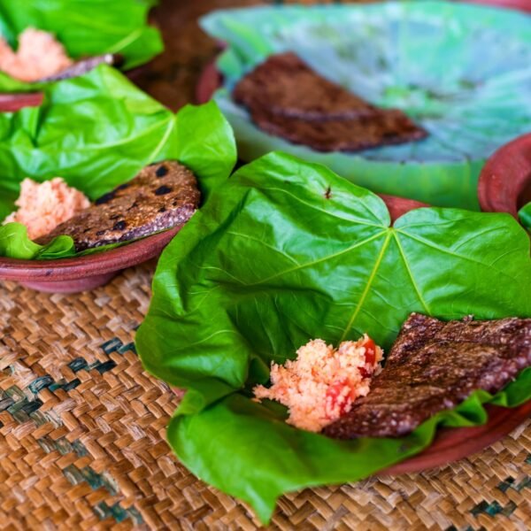 Typical Sri Lankan grains and flatbread on lotus leaf